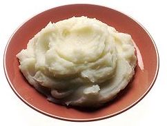 Mashed potatoes on a plate.