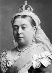 Black and white profile photo of Queen Victoria wearing finery including a crown, sash, earrings, and necklace.